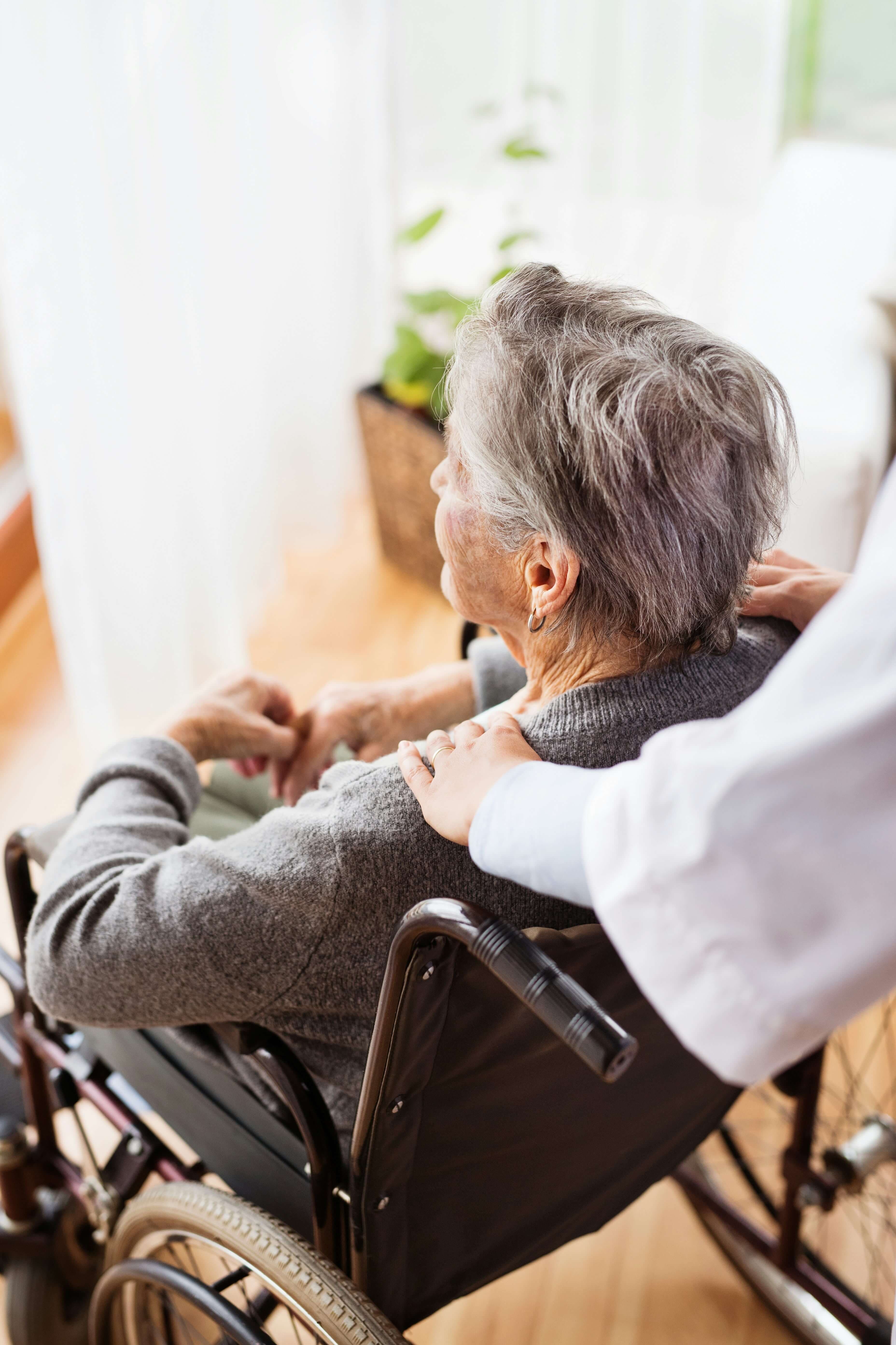 Family sitting with caregiver